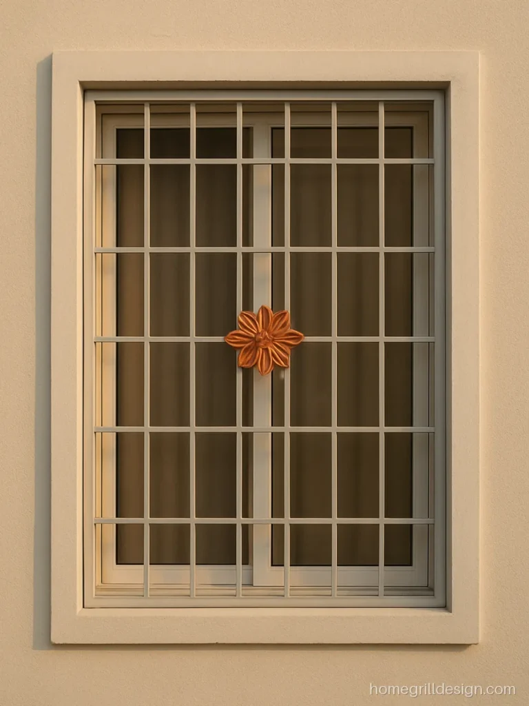 Grey and copper two colour grill with a copper flower on a bedroom window